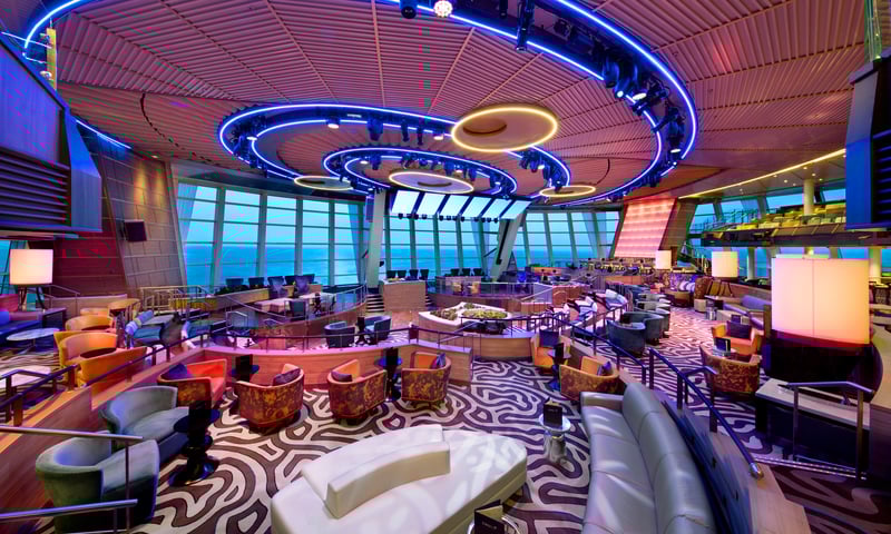 Soak in the vibrant atmosphere of Two70 Lounge aboard Anthem of the Seas.