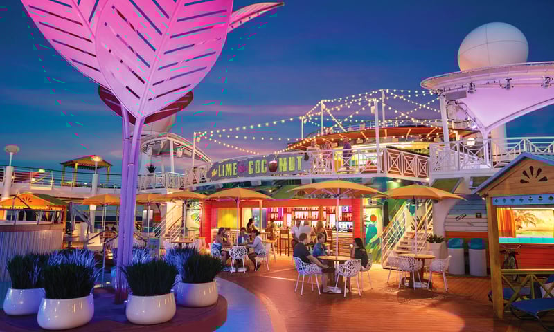 Relax at a poolside bar onboard the Royal Caribbean ship.