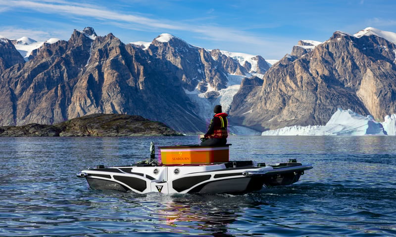 Enjoy custom-embroidered leather upholstery and a champagne chiller in the submarine.