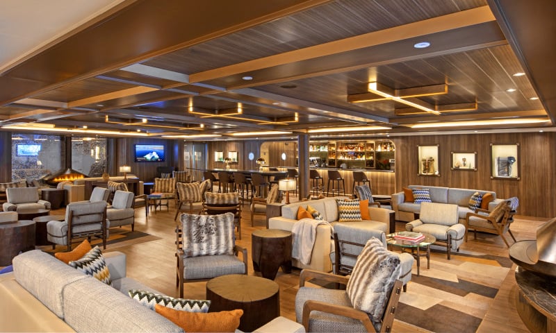 Gather with fellow travellers in the Expedition Lounge aboard the Seabourn ship.