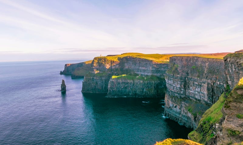 Admire the Atlantic Ocean from the Cliffs of Moher in County Clare, Ireland.