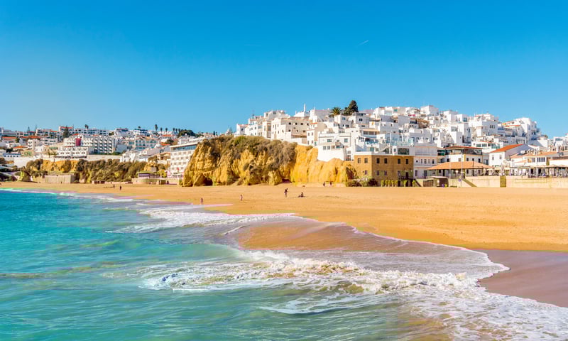 Walk along the sandy beaches of Albufeira, Portugal, Spain (Itinerary 2).
