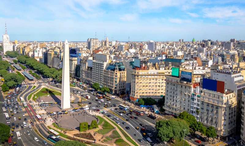 Marvel at the Obelisk and 9 de Julio Avenue in Buenos Aires, Argentina.