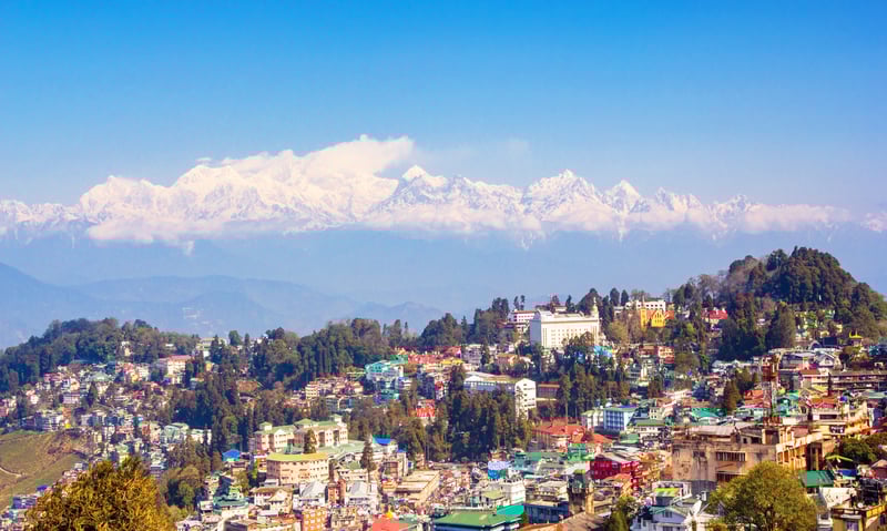 Experience the panoramic vistas from Darjeeling, India.