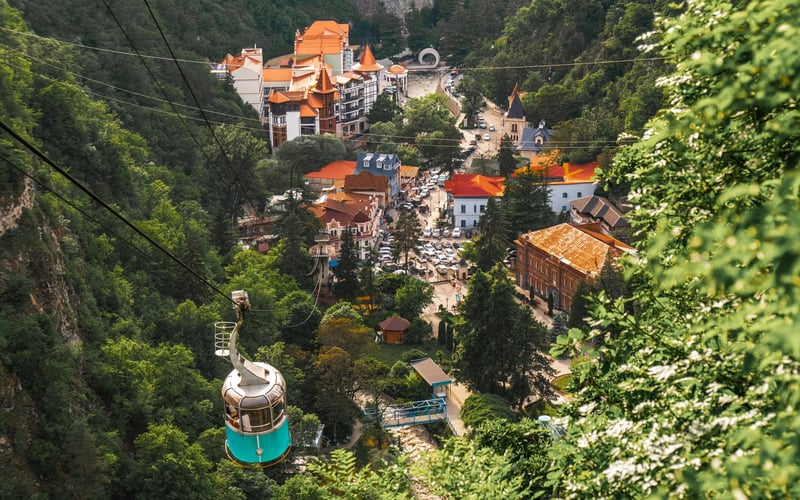 The resort town of Borjomi, famous for its mineral water and being within a picturesque valley.