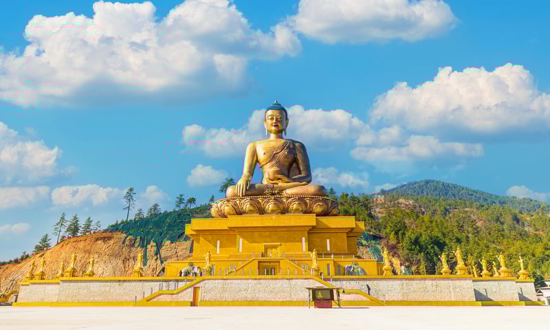 Stop by the gigantic Buddha Dordenma in Thimphu, Bhutan.