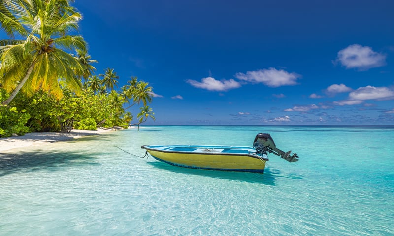 Swim in the turquoise waters surrounding Adaaran Prestige Vadoo, Maldives.