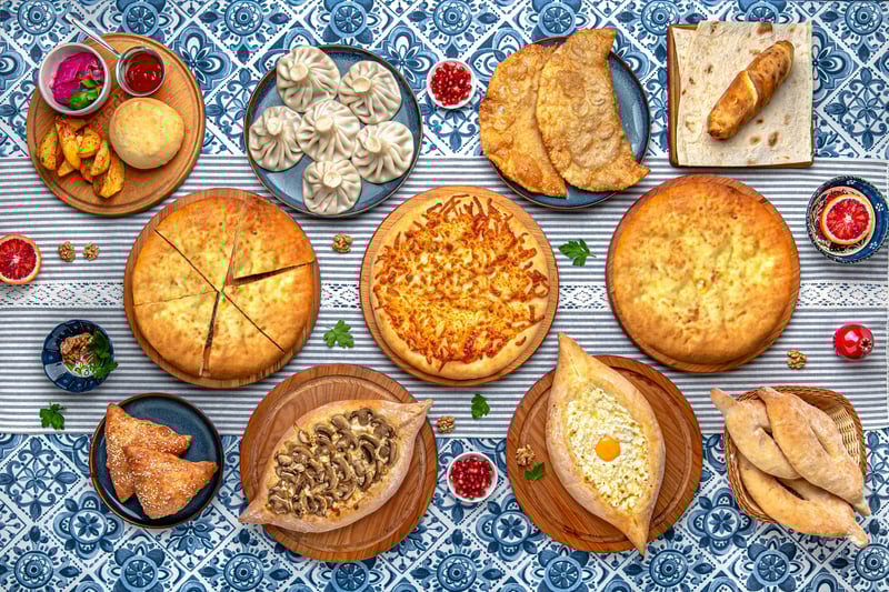 Learn to make khachapuri and khinkali in a hands-on Georgian cooking class.